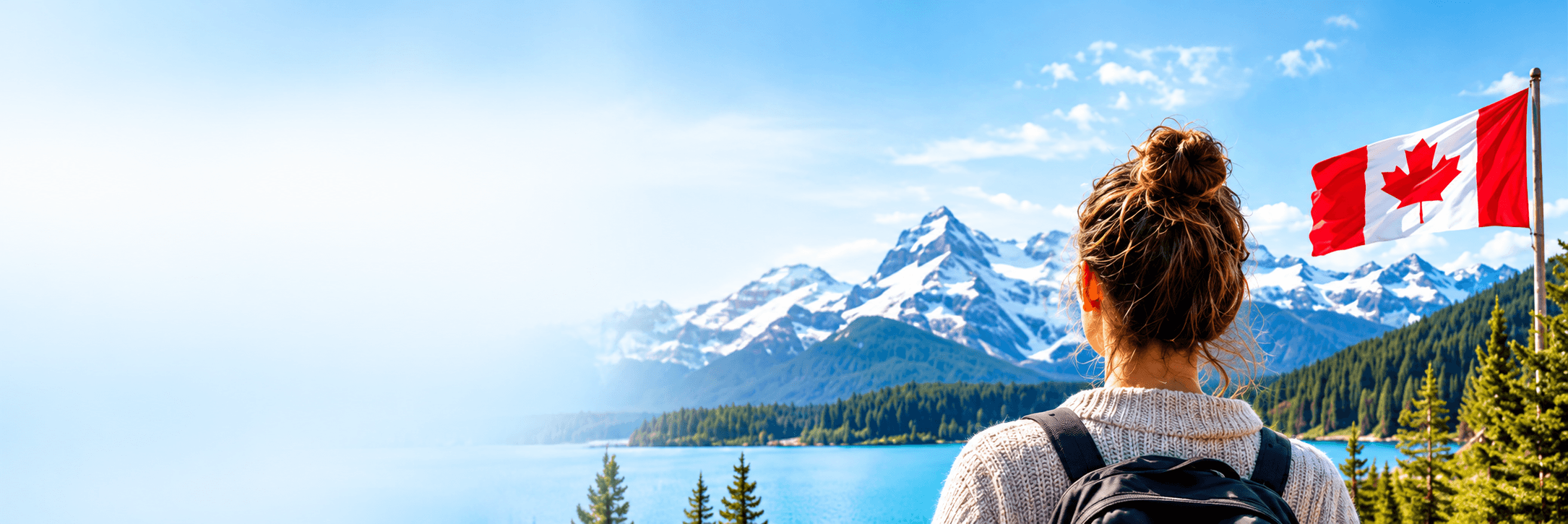 Woman looking at Canadian mountains and lake